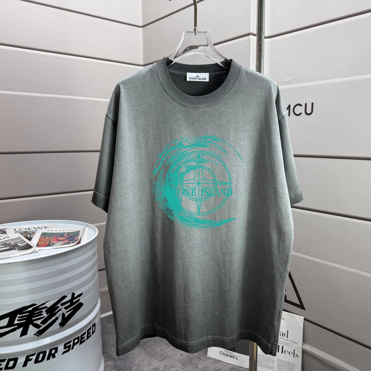 Stone Island Spring–Summer 2026 T-Shirt — 320gsm Washed Distressed Cotton, Teal Swirl Brushstroke Compass Rose Print