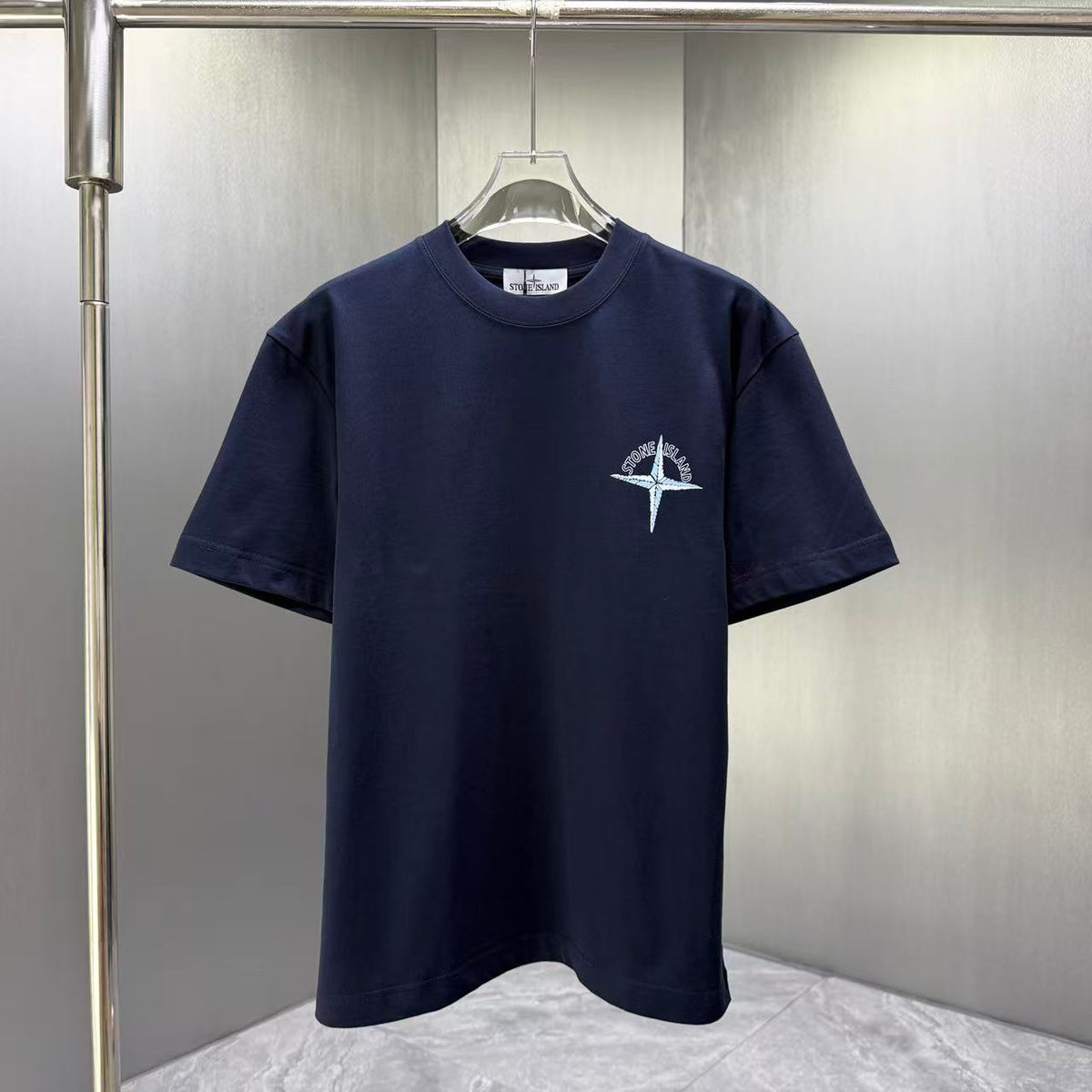 Stone Island Spring–Summer 2026 T-Shirt — Crystalline Prism-Effect Compass Star Print at Right Chest
