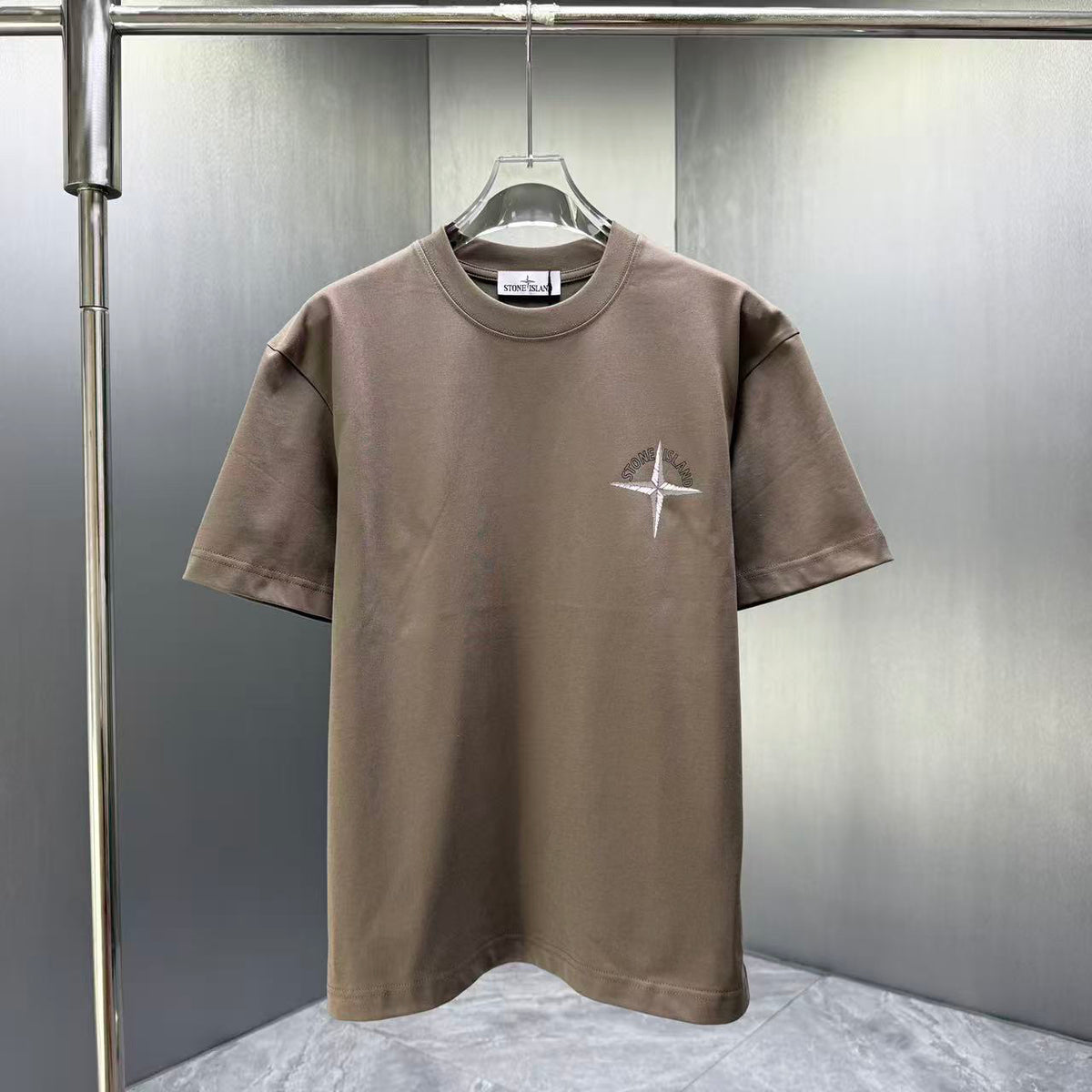 Stone Island Spring–Summer 2026 T-Shirt — Crystalline Prism-Effect Compass Star Print at Right Chest