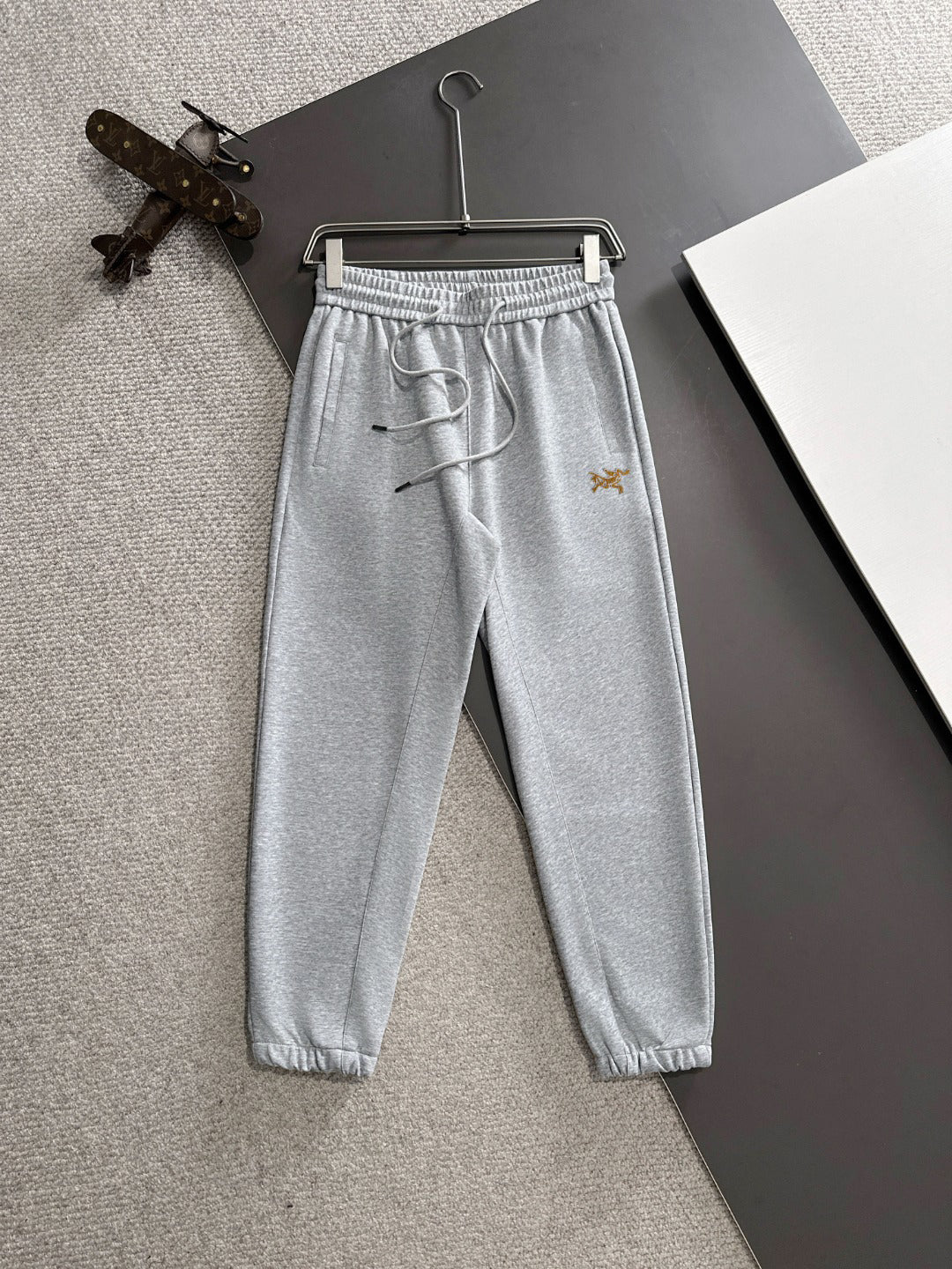 Arc'teryx Gold Bird Embroidered Elastic Waist Tapered Jogger Pants