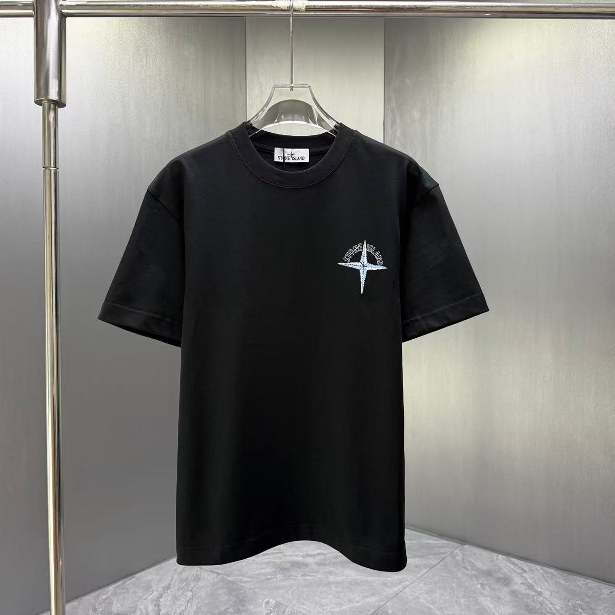 Stone Island Spring–Summer 2026 T-Shirt — Crystalline Prism-Effect Compass Star Print at Right Chest