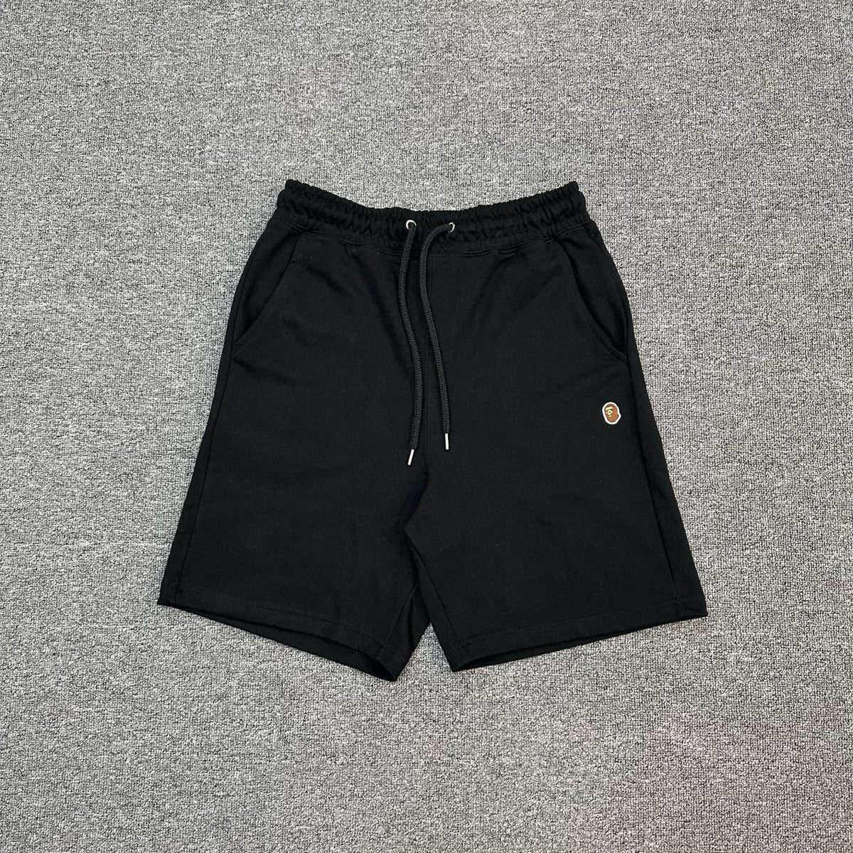 A Bathing Ape SS25 Gold Ape Head Woven Patch Shorts - Black