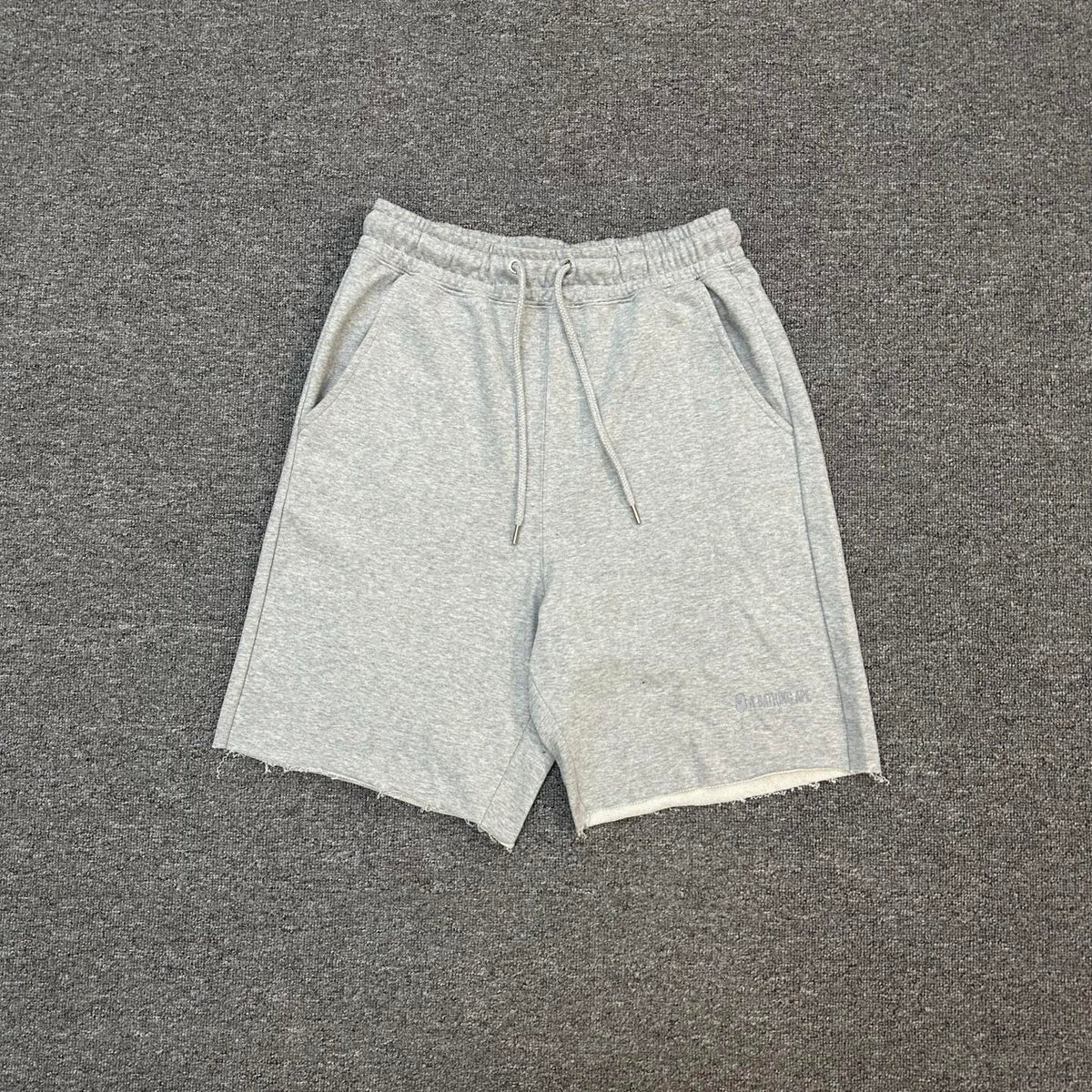 A Bathing Ape Wordmark Embroidered Raw Hem Shorts - Black / Gray