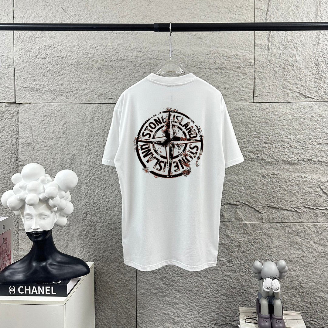 Stone Island Spring–Summer 2026 T-Shirt - Flame-Tipped Compass Star at Chest, Distressed Oversized Badge at Back