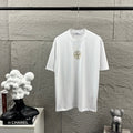 Stone Island Spring–Summer 2026 T-Shirt - Gold Foil Compass Badge at Centre Chest
