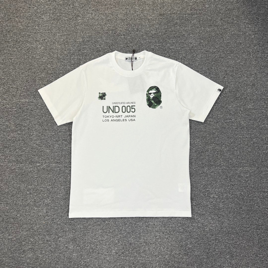 UNDEFEATED × BAPE Airlines UND 005 Tokyo–LA Camo Tee Oversized Unisex T-Shirt