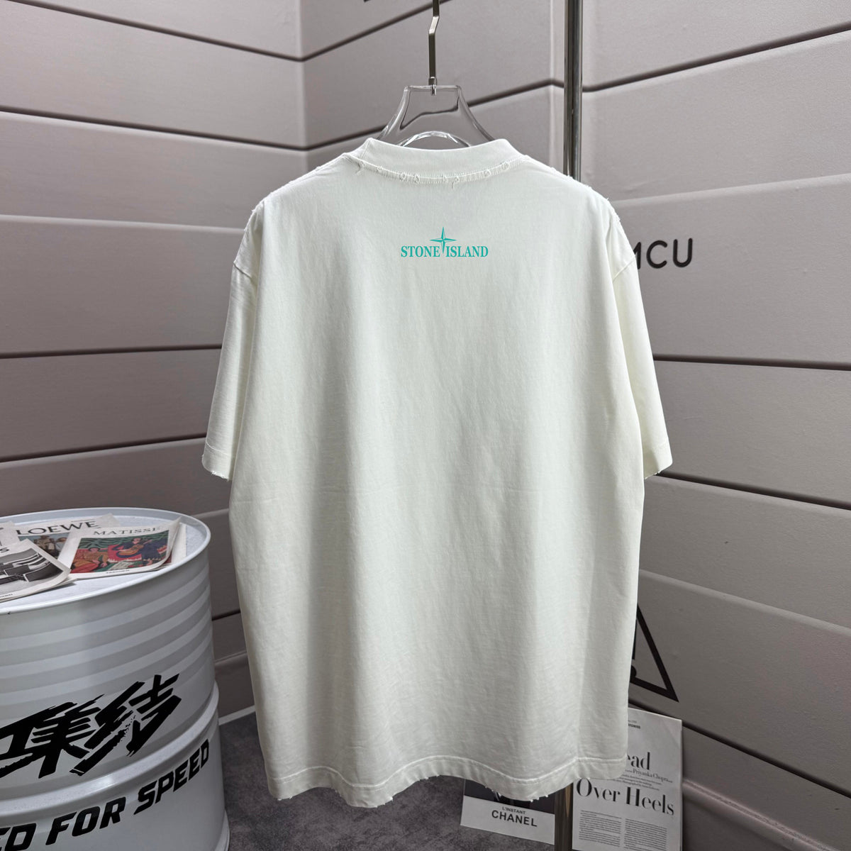 Stone Island Spring–Summer 2026 T-Shirt — 320gsm Washed Distressed Cotton, Teal Swirl Brushstroke Compass Rose Print