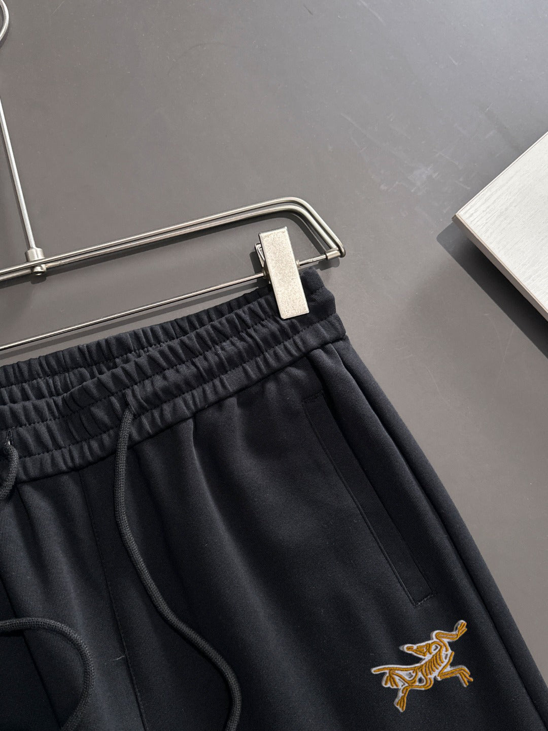 Arc'teryx Gold Bird Embroidered Elastic Waist Tapered Jogger Pants