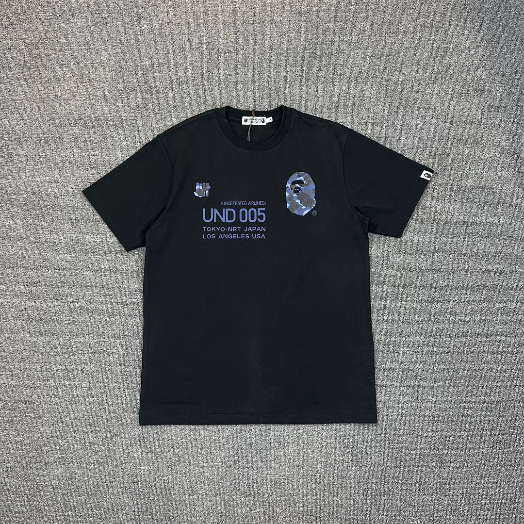 UNDEFEATED × BAPE Airlines UND 005 Tokyo–LA Camo Tee Oversized Unisex T-Shirt
