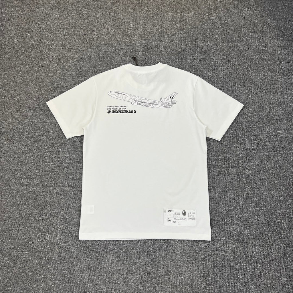 UNDEFEATED × BAPE Airlines UND 005 Tokyo–LA Camo Tee Oversized Unisex T-Shirt