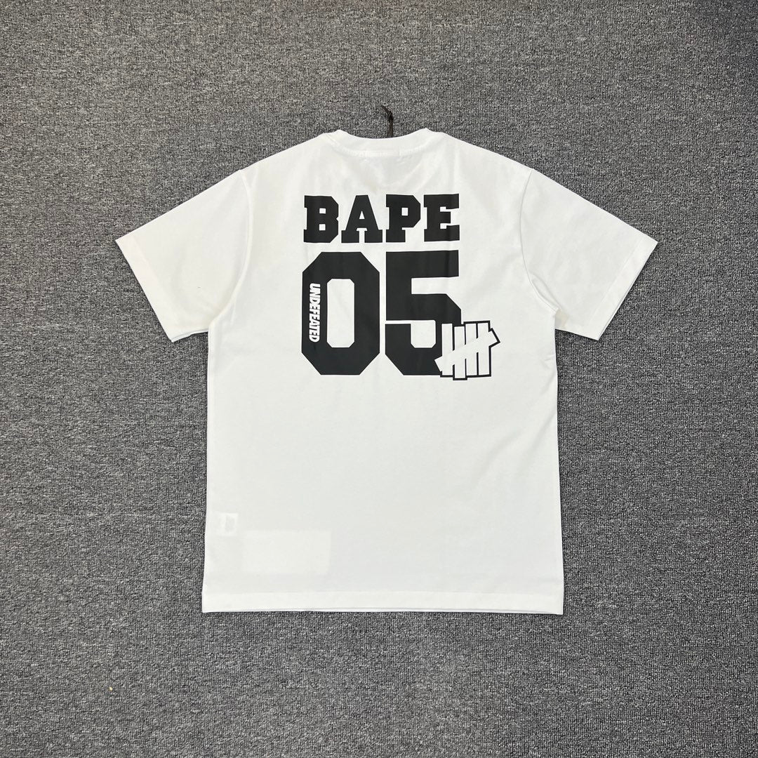 UNDEFEATED × BAPE Five Strike Ape Head College Tee Oversized Unisex T-Shirt