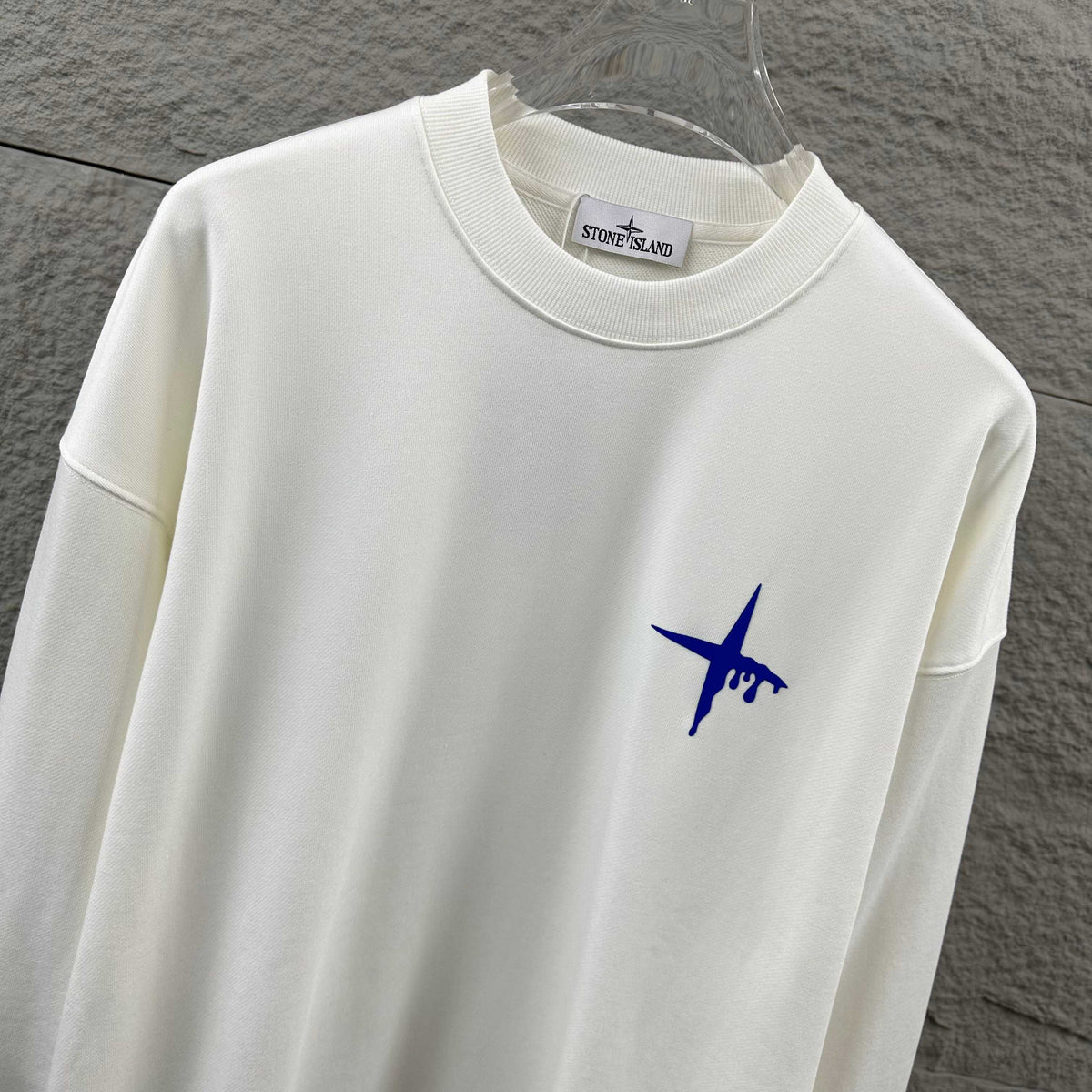 Stone Island Early Autumn–Winter 2026 Sweatshirt — Dripping Compass Star Flocked Logo at Left Chest, Dripping Compass Badge at Centre Back