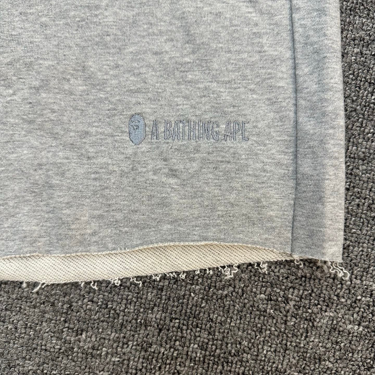 A Bathing Ape Wordmark Embroidered Raw Hem Shorts - Black / Gray