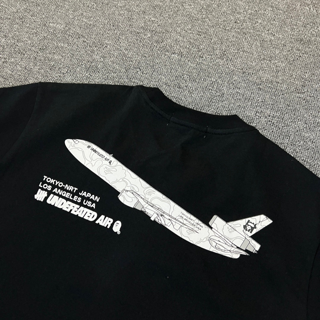 UNDEFEATED × BAPE Airlines UND 005 Tokyo–LA Camo Tee Oversized Unisex T-Shirt