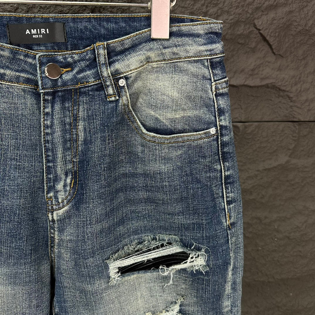 AMIRI Ripped Ribbed Patch Slim‑Fit Denim Jeans