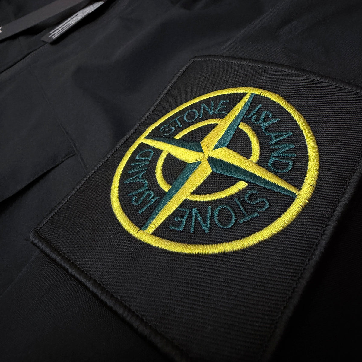 Stone Island Hooded Shell Jacket — Yellow & Teal Embroidered Compass Badge, YKK Full-Length Concealed Zip, Storm Flap