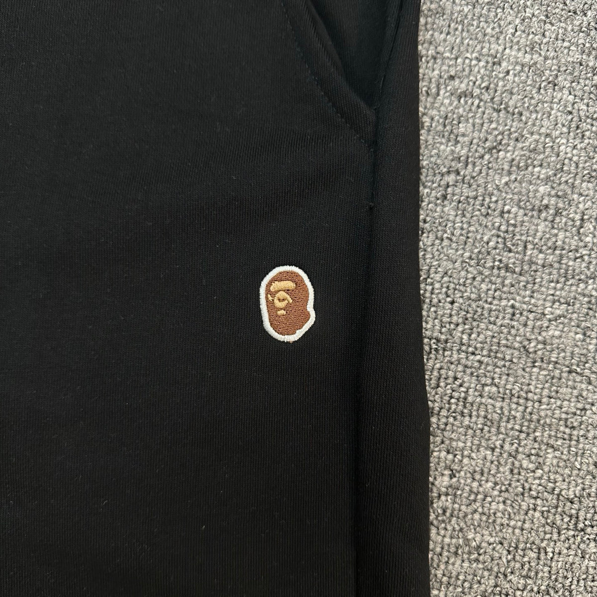A Bathing Ape SS25 Gold Ape Head Woven Patch Shorts - Black