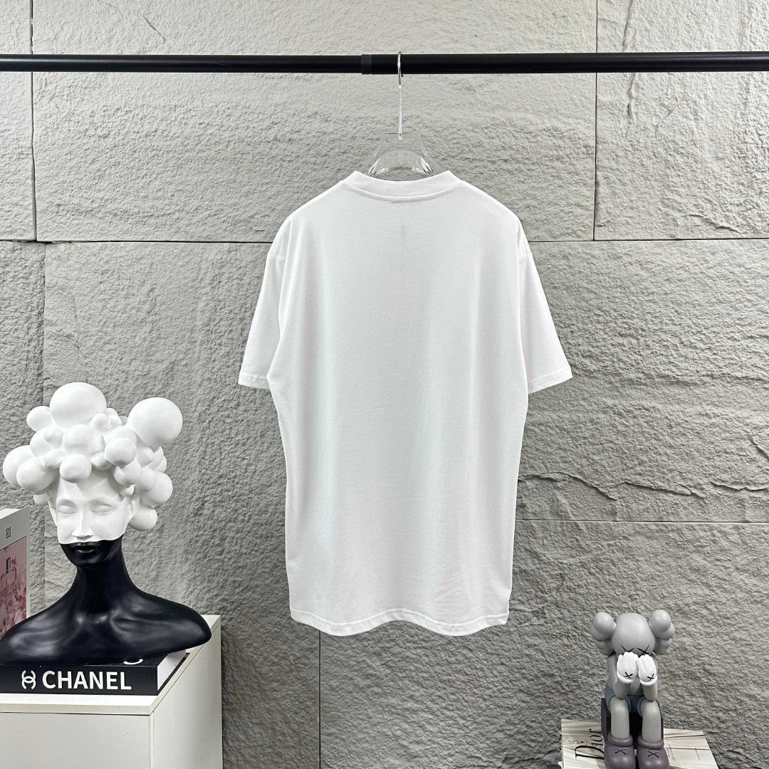 Stone Island Spring–Summer 2026 T-Shirt - Hyper-Realistic Bronze Compass Badge at Centre Chest, Plain Back