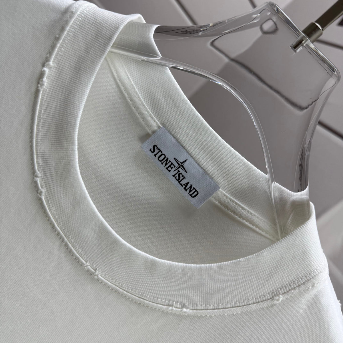 Stone Island Spring–Summer 2026 T-Shirt — 320gsm Washed Distressed Cotton, Teal Swirl Brushstroke Compass Rose Print