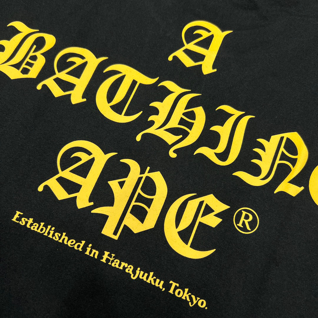 BAPE World Gone Mad Old English Blackletter Ape Head Small-Print Tee Oversized Unisex T-Shirt