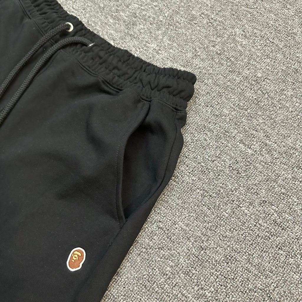 A Bathing Ape SS25 Gold Ape Head Woven Patch Shorts - Black