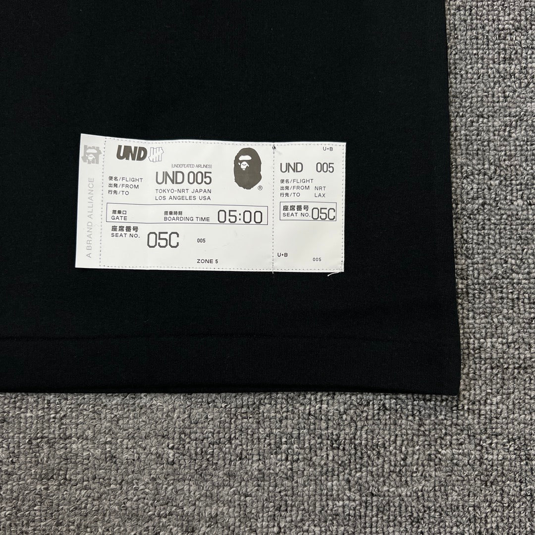 UNDEFEATED × BAPE Airlines UND 005 Tokyo–LA Camo Tee Oversized Unisex T-Shirt