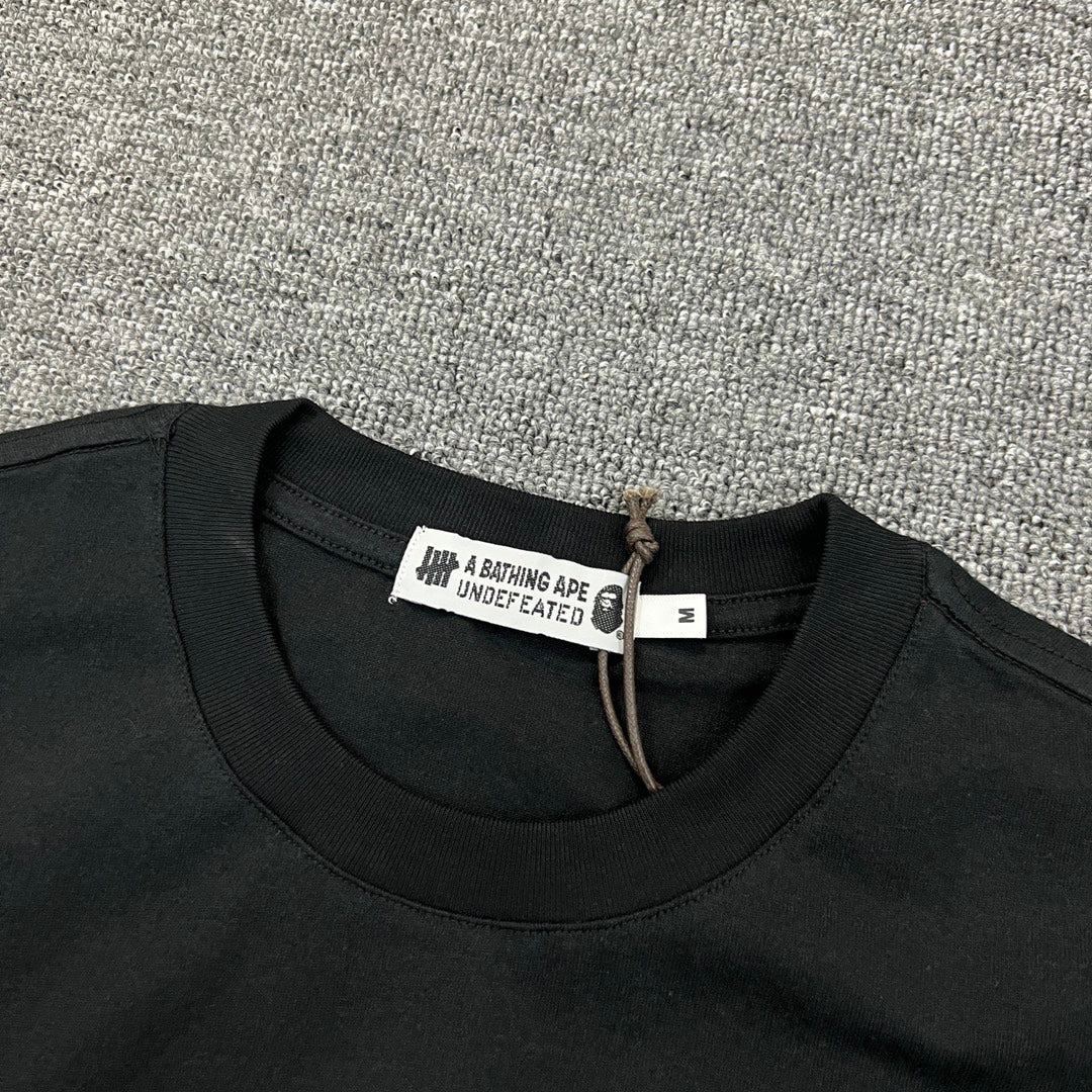 UNDEFEATED × BAPE Airlines UND 005 Tokyo–LA Camo Tee Oversized Unisex T-Shirt