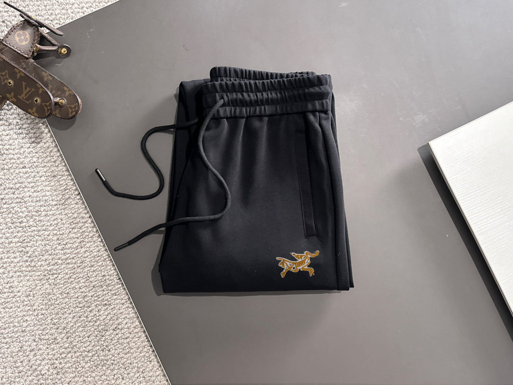 Arc'teryx Gold Bird Embroidered Elastic Waist Tapered Jogger Pants